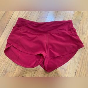 Red 2.5 inch low rise speed up lululemon shorts